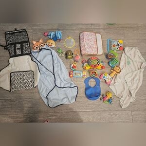 Assorted Baby Toys and Accessories Changing Pad Portable Hooded Towels
